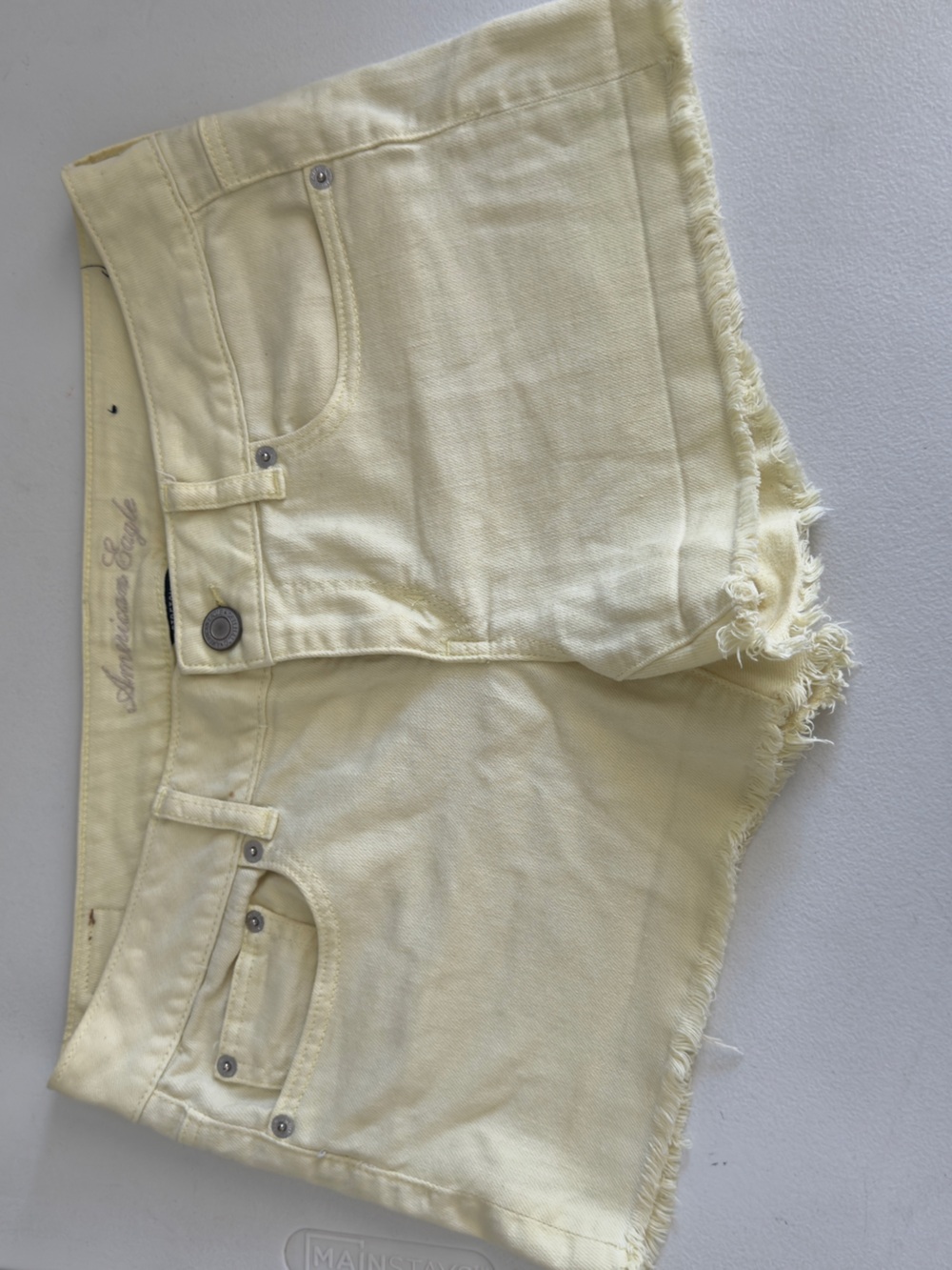 American Eagle Outfitters Pale Yellow Denim Frayed-Hem Jean Shorts